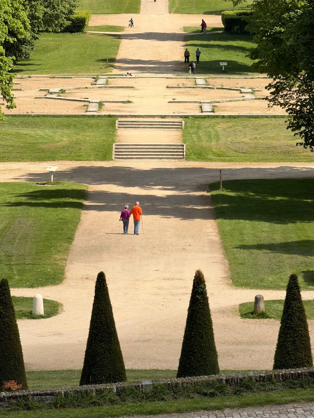 senior couple walking in park
